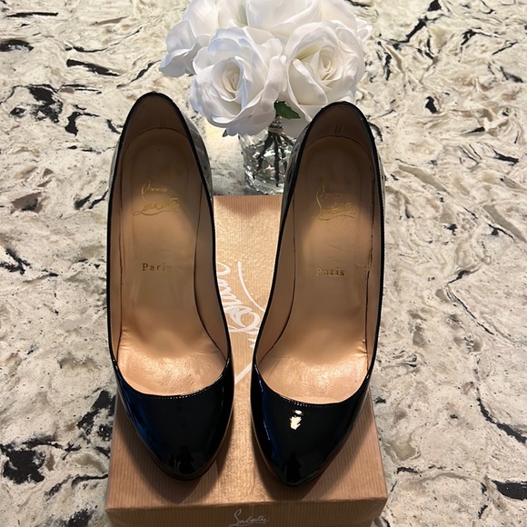 Christian Louboutin (red bottoms) Filo